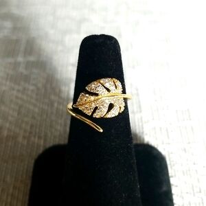 Adjustable gold plated ring with rhinestones leaf